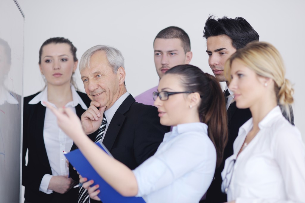 Senior business man giving a presentation